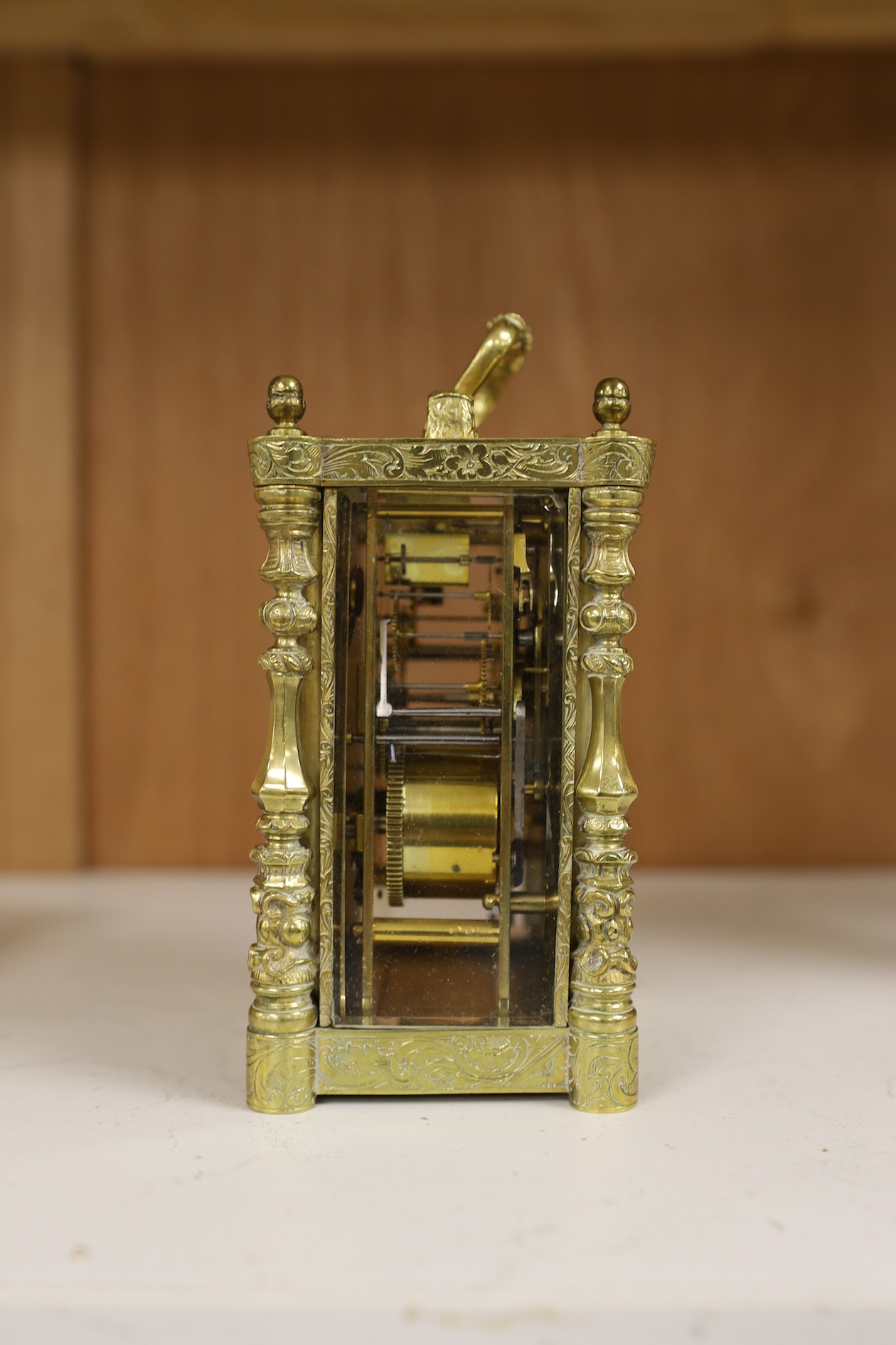 A repeating carriage clock by Auguste, Paris (missing bell), 13.5cm including handle. Condition - case and glass fair, untested if working